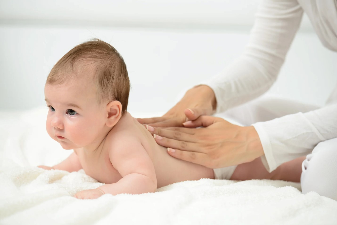 Health of baby's skin and hair with olive oil