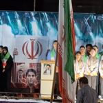 اجرای سرود دانش آموزان در اجتماع مردمی گناوه